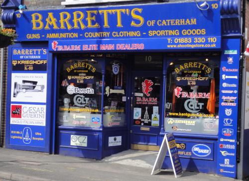 The Barrett's of Caterham shopfront on the High Street, with guns, ammunition and country clothing